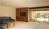 Photo 18 Media and Cinema room with retractable projection screen and automatic blackout screens